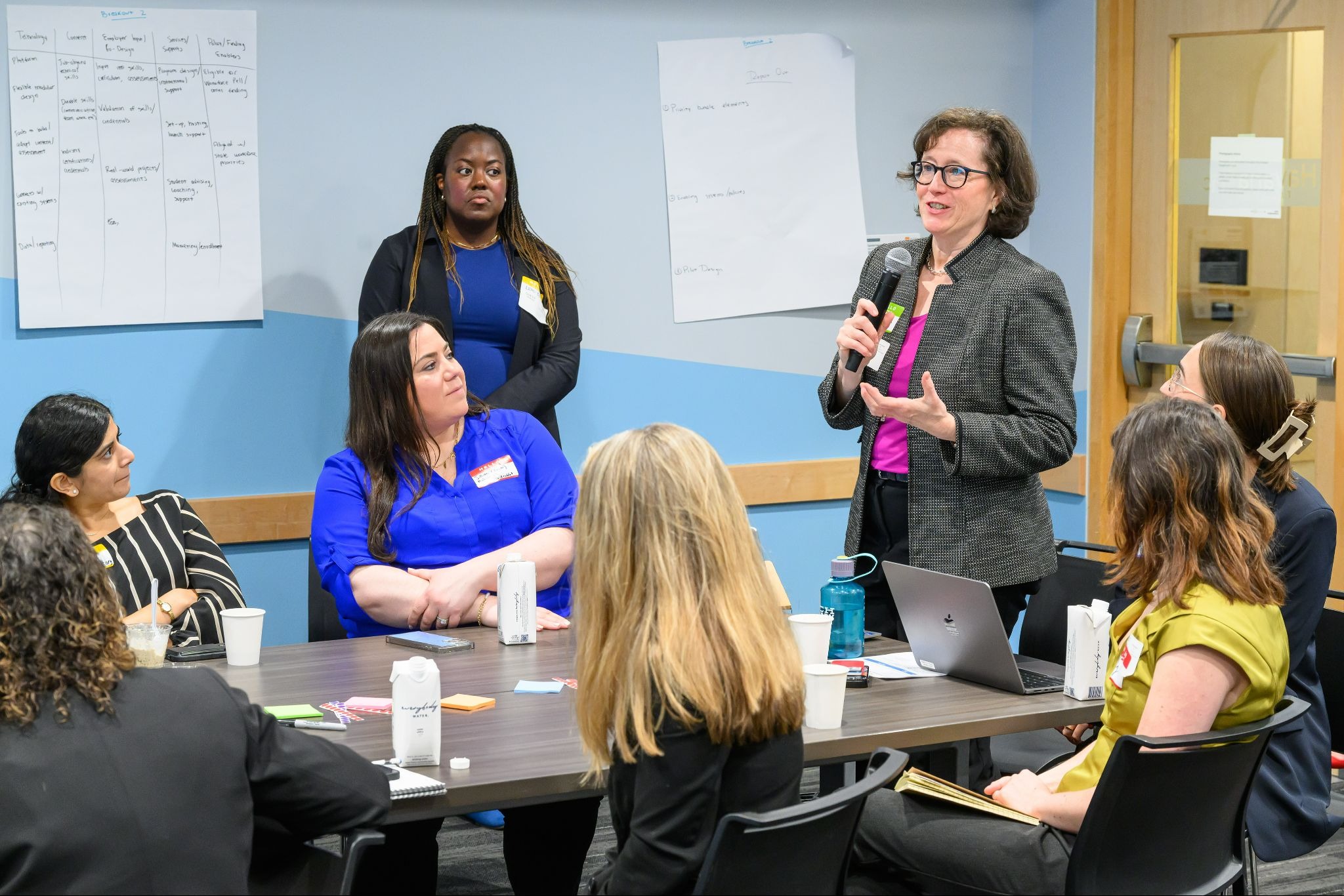 Facilitator leading a cross-sector Elevate Impact workshop breakout